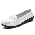 Elegant white leather loafers with braided strap and durable black rubber sole. - 35 / White