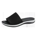 Close-up of black breathable flyknit slide sandal for women on a pure white background - Black