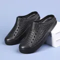 Classic black slip-on mules with ventilation holes designed for summer outdoor beach use - 36 / Black