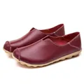 Stylish women's burgundy pebbled leather loafers featuring comfortable flat non-slip rubber soles - Burgundy