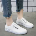 Casual women's white leather sneakers with lace-up design and round toe - 35 / White (With Black)