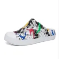 White graffiti print clog sandals for outdoor beach wear with non-slip rubber sole - Colorful