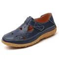 Stylish navy blue women's hollow out leather flat sandals with floral gum sole - Dark Blue