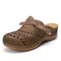 Detail view of brown women's cutout wedge clogs with decorative bow and star patterns - 36 / Dark Brown