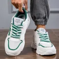 Dettaglio delle sneakers chunky da uomo bianche e verdi con suole spesse e lacci - 39 / Bianco e verde