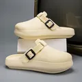 Cream white EVA platform clogs with buckled strap and textured finish. - 36-37 / Khaki