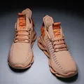 Lightweight tan breathable knit running shoes for men featuring unique orange blade soles - Terracotta
