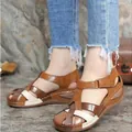 Detail of vintage brown hollow-out women's wedge sandals with Velcro strap - 35 / Dark Brown