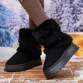 Detailed view of stylish black winter snow boots featuring plush faux fur and side buckle - 36 / Black