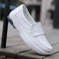 Comfortable white slip-on nurse work shoes featuring soft air cushioned non-slip flat sole - 35 / White