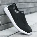Women's black knitted slip-on sneakers with white ribbed collar and chunky sole - 36 / Black