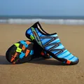 Blue quick-drying beach shoes with colorful patterns on beach sand for outdoor water sports. - 35 / Sapphire Blue