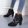 Detailed view of women's black lace mesh ankle boots with chunky heels and floral embroidery - 35 / Black