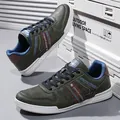 Premium olive green men's casual skateboard shoes with stylish side stripe accents - 39 / Green