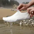 Quick-drying white water shoes for beach surfing and wading, shown dripping in ocean setting - 35 / White