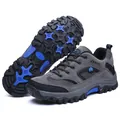 Men's grey hiking shoes with blue accents, durable non-slip rubber outsole for trekking. - 39 / Gray