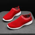 Breathable red knit slip-on walking shoes for women with ultra-light soft white soles. - 35 / Red