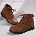 Vintage brown British style lace-up ankle boots featuring a thick black platform sole. - 36 / Yellow