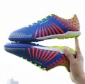 Blaue Fußballschuhe für Herren mit orangen Streifen und neongrünen TF-Turf-Stollen - 36 / Blau