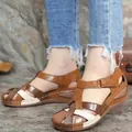 Detailed view of women's vintage roman wedge sandals with stylish multi-color cross straps - 35 / Brown