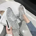 Detailed view of women's silver mesh embroidered platform sneakers with sparkling rhinestones - 36 / Silver