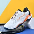 Chaussure de tennis respirante professionnelle en blanc et orange pour sportifs - 36 / Blanc Orange
