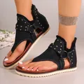 Black canvas flat thong sandals for women with gold rivets and frayed edges - 36 / Black