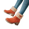 Detailed view of women's orange suede snow boots with white shearling cuffs and block heels - 35 / Orange