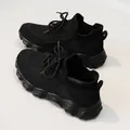 Atmungsaktive schwarze Fly-Knit-Socken-Sneaker mit Slip-on-Design für aktive Damen - Schwarz