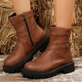 Retro brown women's combat boots with buckle detail shown on a rustic straw background - 38 / Matte Yellow
