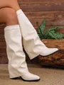 Detailed view of cream slouchy pointed-toe knee-high boots with chunky high heels - 36 / Leather Style / Beige