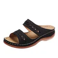 Side view of black wedge sandals with intricate cut-out patterns and white stitching - 36 / Black