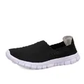 Sneaker slip-on in maglia nera con tomaia elastica traspirante e suola bianca - 35 / Bianco e nero