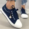 Stylish navy blue polka dot canvas sneakers with white toe cap and cute flower charm - 38 / Dark Blue