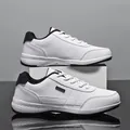 White leather casual sneakers with waterproof tag for men, stylish athletic board shoes. - 38 / White