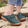 Casual dark green hollow-out mule sandals with floral detail and thick brown sole - 35 / Green