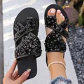 Sandales à paillettes noires avec brides croisées et semelle souple pour la plage. - 36 / Noir