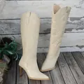 Stylish cream women's high-heeled boots with leaf embroidery and pointed stiletto. - 36 / Off White