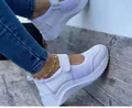 Detailed close-up of white casual wedge sneakers for women with hook-and-loop straps - 35 / White