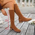 Detailed view of brown suede knee-high boots showing 36cm shaft and 3.5cm low heel - Tan
