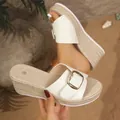 Close-up of white summer wedge sandal with woven jute sole and gold buckle detail - 40 / White