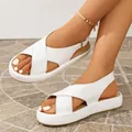 Close-up detail of women's white platform sandals featuring a comfortable cross-strap design - 35 / White