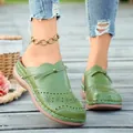 Summer stylish green flat clogs for women featuring hollow-out floral patterns and bow strap - 36 / Verdant