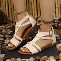 Elegant cream Roman flat sandals for women featuring braided straps and back zipper - 36 / Off White