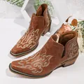 Vintage brown western style ankle boots featuring intricate floral embroidery and chunky heel - 35 / Tan