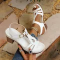 Elegant white peep-toe chunky heel sandals with decorative cutout detail and buckle strap - 38 / White