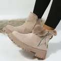 Dettaglio stivali da neve in camoscio beige con fodera in pelliccia spessa - 35 / Albicocca