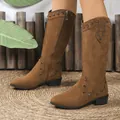 Side detail of brown suede mid-calf boots with metal studs and vintage zipper. - 36 / Brown
