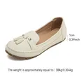 Comfortable beige tassel loafers for women with a soft flat sole and retro design - White