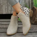 Close-up of leopard print patchwork ankle boots with pointed toe and side zipper - 36 / Off White